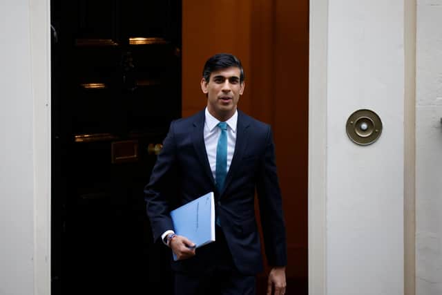 Chanclelor Rishi Sunak leaves Downing Street ahead of last week's Spending Review.
