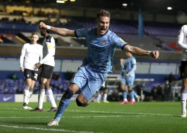 On target: Coventry City's Leo Ostigard celebrates scoring his side's third goal.