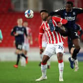 Challenge: Stoke City's Tyrese Campbell and Middlesbrough's Marc Bola.