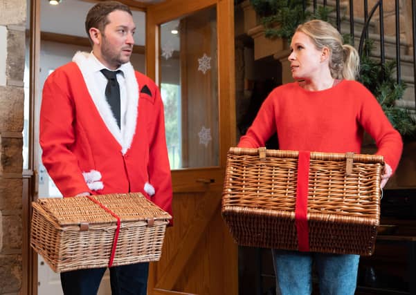 Jon is unimpressed by his hamper size vs Lucy's. Picture: PA Photo/UKTV/Vish Sharma.