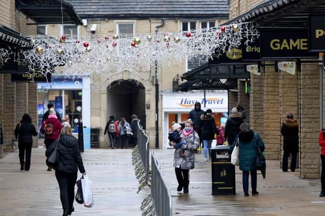 Shoppers in Halifax in the run up to Christmas. The Piece Hall hosts a number of independent Yorkshire-based shops.