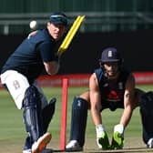 Heading home: England captain Eoin Morgan plays a shot as wicketkeeper Jos Buttler looks on during a net session. Picture: Shaun Botterill/Getty Images