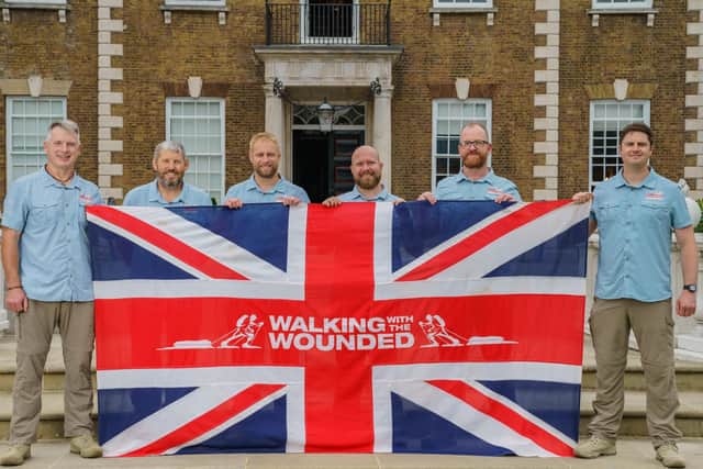 Walking With The Wounded Grenadier Walk of Oman challenge celebrate the official launch. Far right Ben McComb.
Image credit: Pinpep / Walking With The Wounded