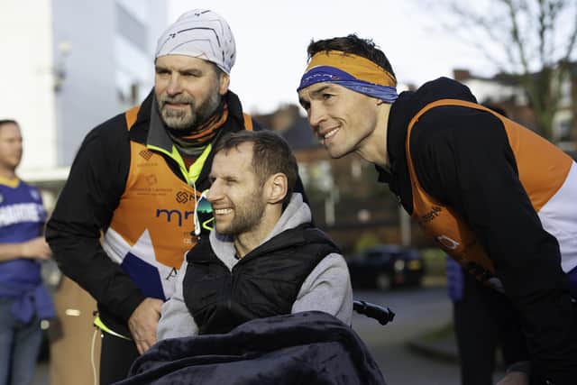 kevin Sinfield with Rob Burrow during his 7 in 7 marathon challenge.