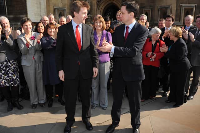 Labour leader Ed Miliband (right) and his shadow cabinet welcome Jarvis, to the House of Commons in London in 2011.  Picture: Stefan Rousseau/PA Wire