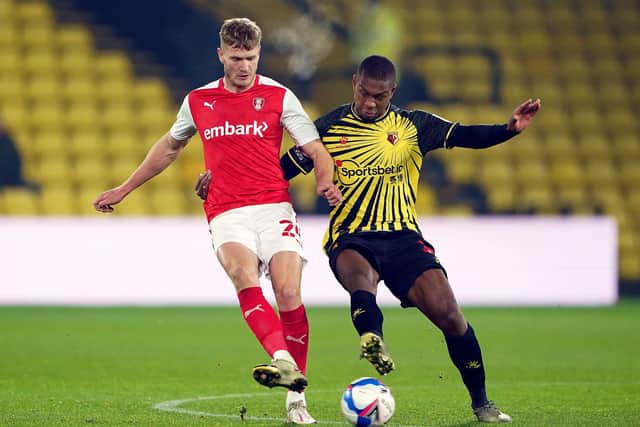 Rotherham United's Michael Smith (left) and Watford's Christian Kabasele battle for the ball.