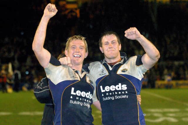 26th April 2005. Players Alix Popham, left, and Colm Rigney, right, celebrate after the full time whistle after the Tykes beat Harlequins.