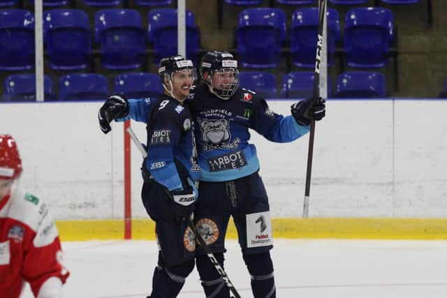 BRIGHT FUTURE: Alex Graham, right, celebrates with Ben Lake after scoring against Swindon in the recent Streaming Series. Picture: Cerys Molloy.