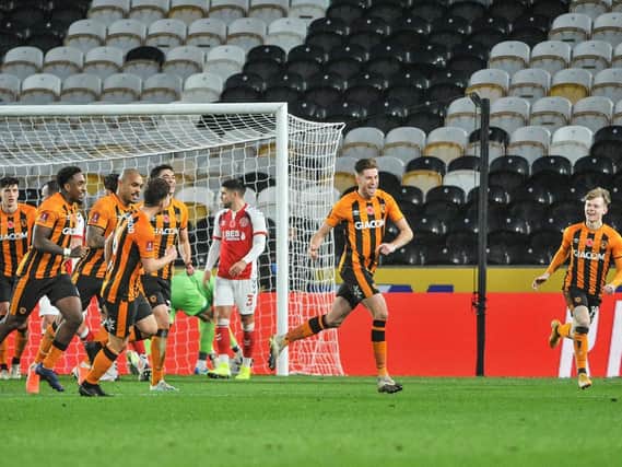 RIVALRY: Hull City's Reece Burke celebrates scoring against Fleetwood Town in the FA Cup