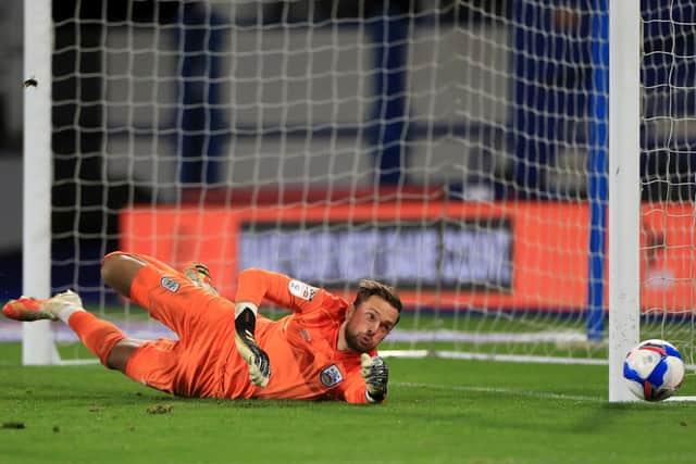 Huddersfield Town goalkeeper Ben Hamer makes a save during the Sky Bet Championship match at The John Smith's Stadium, Huddersfield. (Picture: PA)