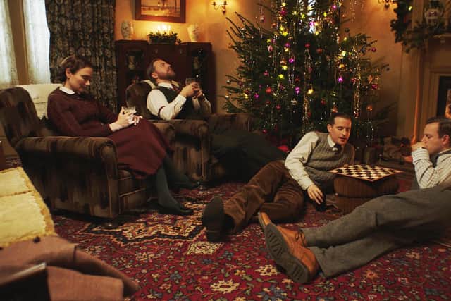 Jackets off and time for festive contemplation. 
The vets and Mrs Hall relaxing on Christmas Day in front of the fire. Images courtesy of Channel 5 and Playground Entertainment.