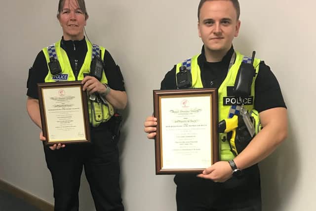 Pcs Heidi McLoughlin and Jordan Drummond, who have received commendations from the Royal Humane Society for saving a man trying to end his life