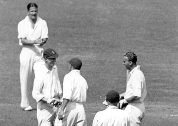 Well done: Len Hutton is congratulated by Don Bradman. Pictures: Getty Images