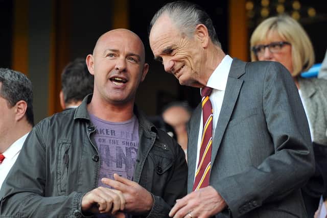 Huddersfield Giants' chairman Ken Davy talks to former Giants' coach Jon Sharp back in 2013. Picture: Anna Gowthorpe/PA