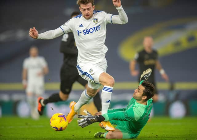 Leeds United’s Patrick Bamford is brought down by Lukasz Fabianski for an early spot-kick for the hosts at Elland Road last night. Picture: Bruce Rollinson