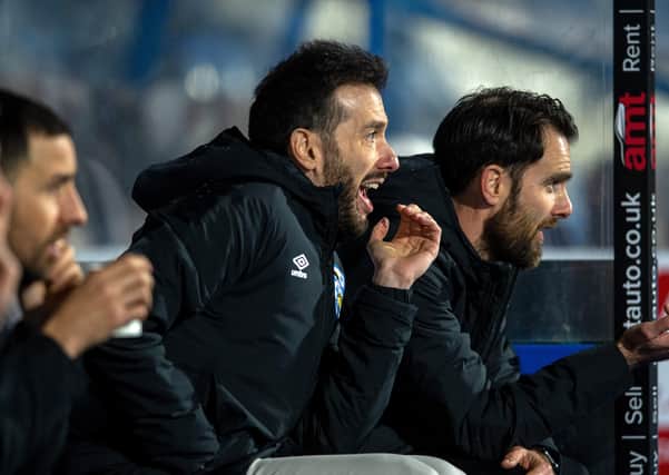 Huddersfield Town manager, Carlos Corberán, bellows orders to his players during the midwekk win over Yorkshire rivals Sheffield Wednesday.  Picture: Bruce Rollinson