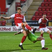 Get in: Rotherham's Michael Smith holds off  Bristol's Zak Vyner to score his side's second goal. Pictures: Jonathan Gawthorpe