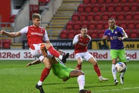Get in: Rotherham's Michael Smith holds off  Bristol's Zak Vyner to score his side's second goal. Pictures: Jonathan Gawthorpe