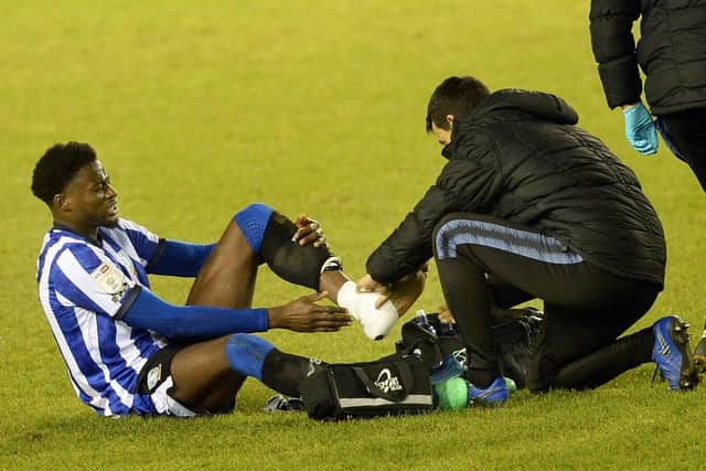 Blow: Dominic Iorfa receiving treatment before being withdrawn.