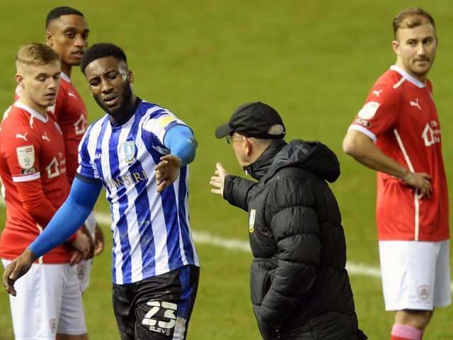 Well done: After a delayed Owls debut, Chey Dunkley gets a well done hand-shake from Tony Pulis after being substituted in the second half.  Picture: Steve Ellis