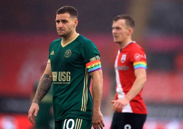 Southampton captain James Ward-Prowse and Sheffield United captain Billy Sharp (left) both wearing rainbow armbands during the Premier League match at St Mary's (Picture: PA)