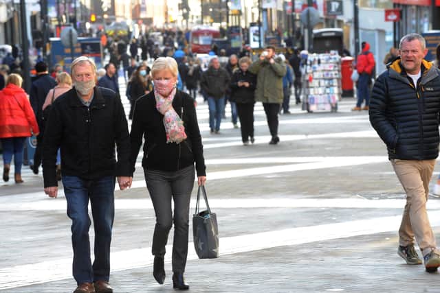 Christmas shoppers in Briggate, Leeds, as the Government prepares to make a new announcement on Tier arrangements.