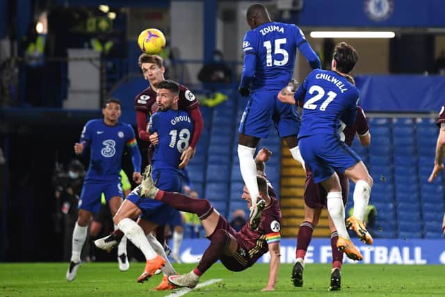 HIGH-RISE: Chelsea's Kurt Zouma (centre) scores his side's second goal against Leeds at Stamford Bridge. Picture: Mike Hewitt/PA