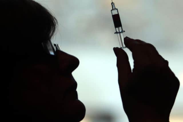The first vaccine to be declared safe and effective and approved for mass use by UK regulators is made by Pfizer-BioNTech. Photo credit: PA