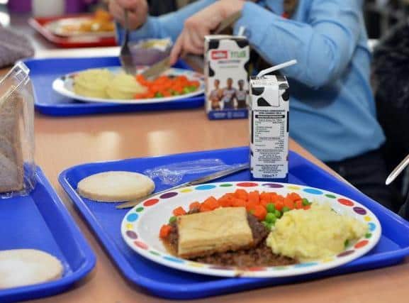 Children in receipt of free school meals in Hull will receive supermarket vouchers over Christmas. Photo credit: PA