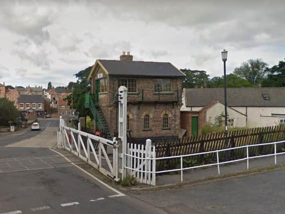 The girls were approached on A684 Bedale Road, Aiskew, near to the railway level crossing (Image: Google)