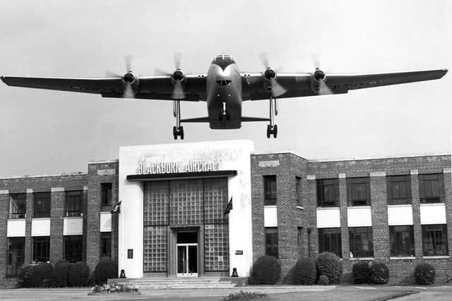 A Blackburn Beverley transport plane flying over the Brough site's offices in 1957