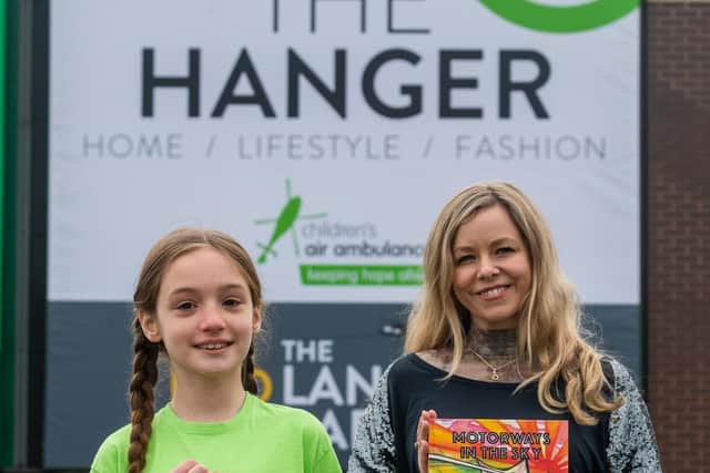 Pictured Chloe Hadley, aged 8, (left) with author Stacey Turner (right) at the Doncaster superstore, THE HANGER. Photo credit: James Hardisty/ JPIMediaResell