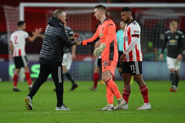 PRIDE: Chris Wilder shakes hands with his former on-loan goalkeeper Dean Henderson at full-time
