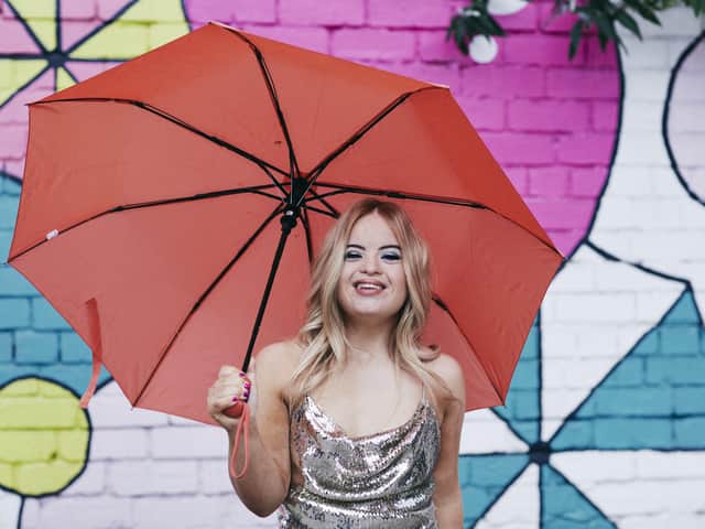 Picture by Rob Smalley of Kate Grant, who has Down's syndrome. She wears a metallic dress from ASOS.