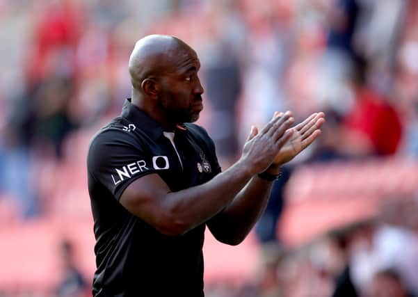 TOP OF THE PILE: Doncaster Rovers manager Darren Moore has overseen a run of three straight wins from his team. Picture: Steven Paston/PA