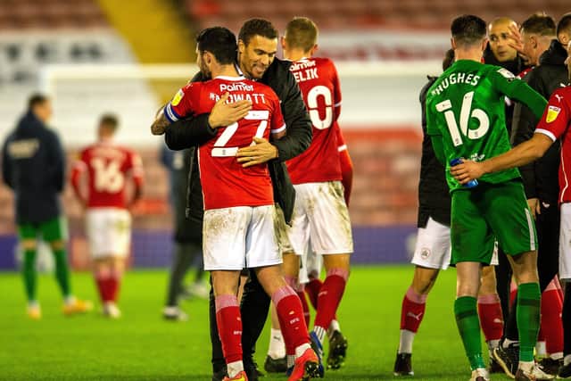 Valerian Ismael celebrates at full-time with Alex Mowatt After Barnsley's win over PReston on Tuesday night. Picture: Bruce Rollinson