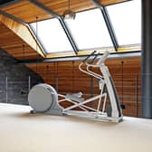 There are many options for exercising at home including creating dedicated space for gym equipment. Picture: PA Photo/WeMakeGyms