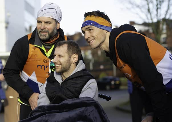 Kevin Sinfield (right) with Rob Burrow outside Headlingey Stadium during his marathon challenge.