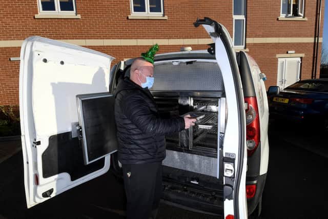 Food Angels. Stephen Wilkins loads up the van. Picture by Simon Hulme