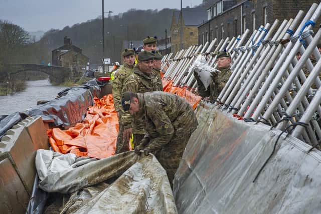 Soldiers had to build temporary flood defences in Mytholmroyd.