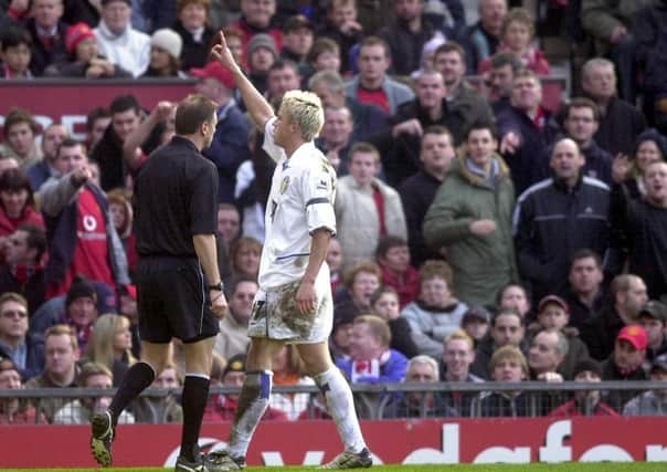 Flashback: 
Leeds United's Alan Smith celebrates after scoring in the last league encounter between the sides in 2004.