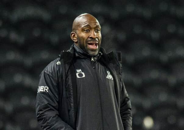 Demanding more: Rovers  manager Darren  Moore. Picture: Tony Johnson