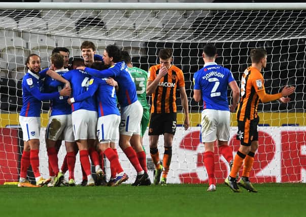 Portsmouth's players celebrate their second goal.  Picture: Jonathan Gawthorpe