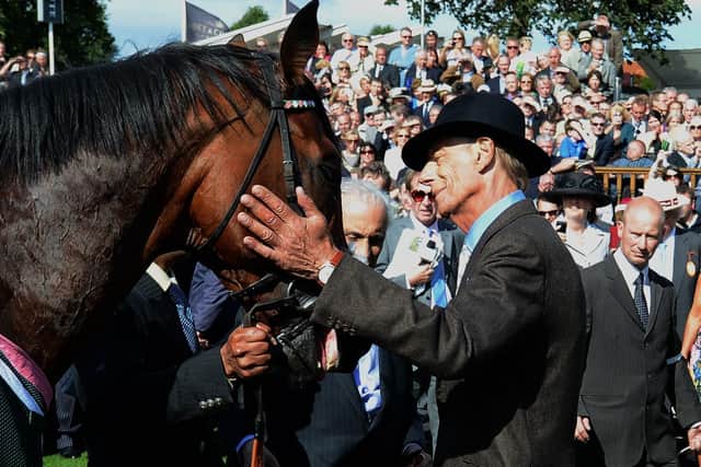 An ailing Sir Henry Cecil strokes Frankel after the horse's win in the 2012 Juddmonte International at York - Simon Cooper's new book Frankel charts the horse's career from foal to stallion.