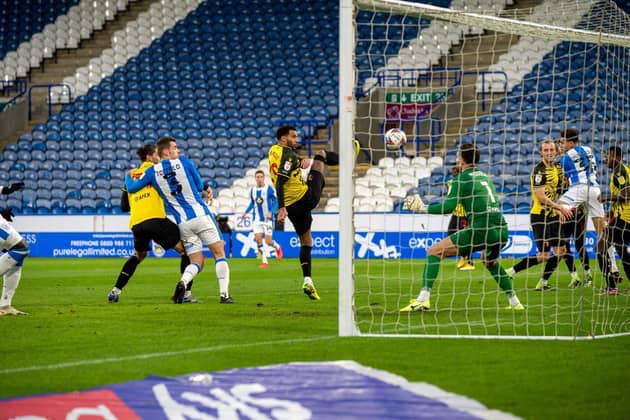 Watford midfielder Etienne Capoue has a horror moment to slice the ball into his own net to put Huddersfield Town 2-0 up. Picture: Bruce Rollinson.