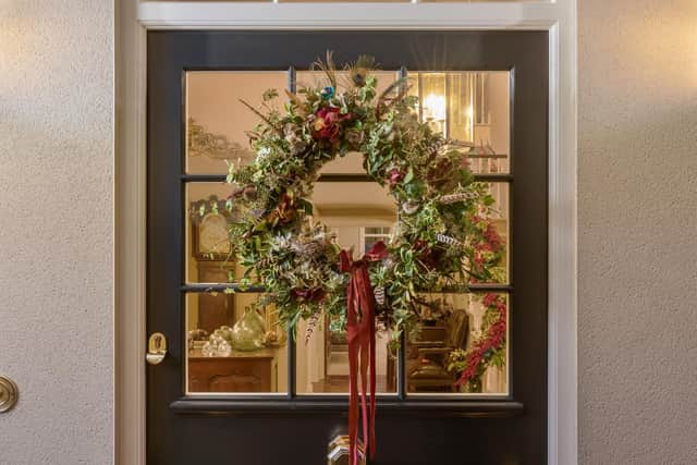 The beautiful door wreath is by Fabric and Flora, Thixendale.