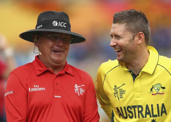 Memoirs: Umpire Ian Gould with Michael Clarke of Australia. Picture: Getty Images