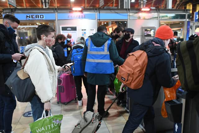 There was a mass exodus at London stations like Paddington (pictured) and King's Cross - and indefiance of Government scientists - after new Tier restrictions for Christmas were confirmed.