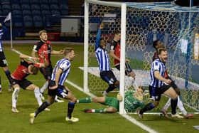 Sheffield Wednesday's Tom Lees heads home the only goal of the game.    Picture: Steve Ellis