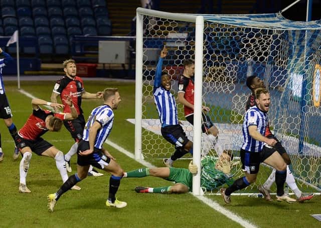 Sheffield Wednesday's Tom Lees heads home the only goal of the game.    Picture: Steve Ellis